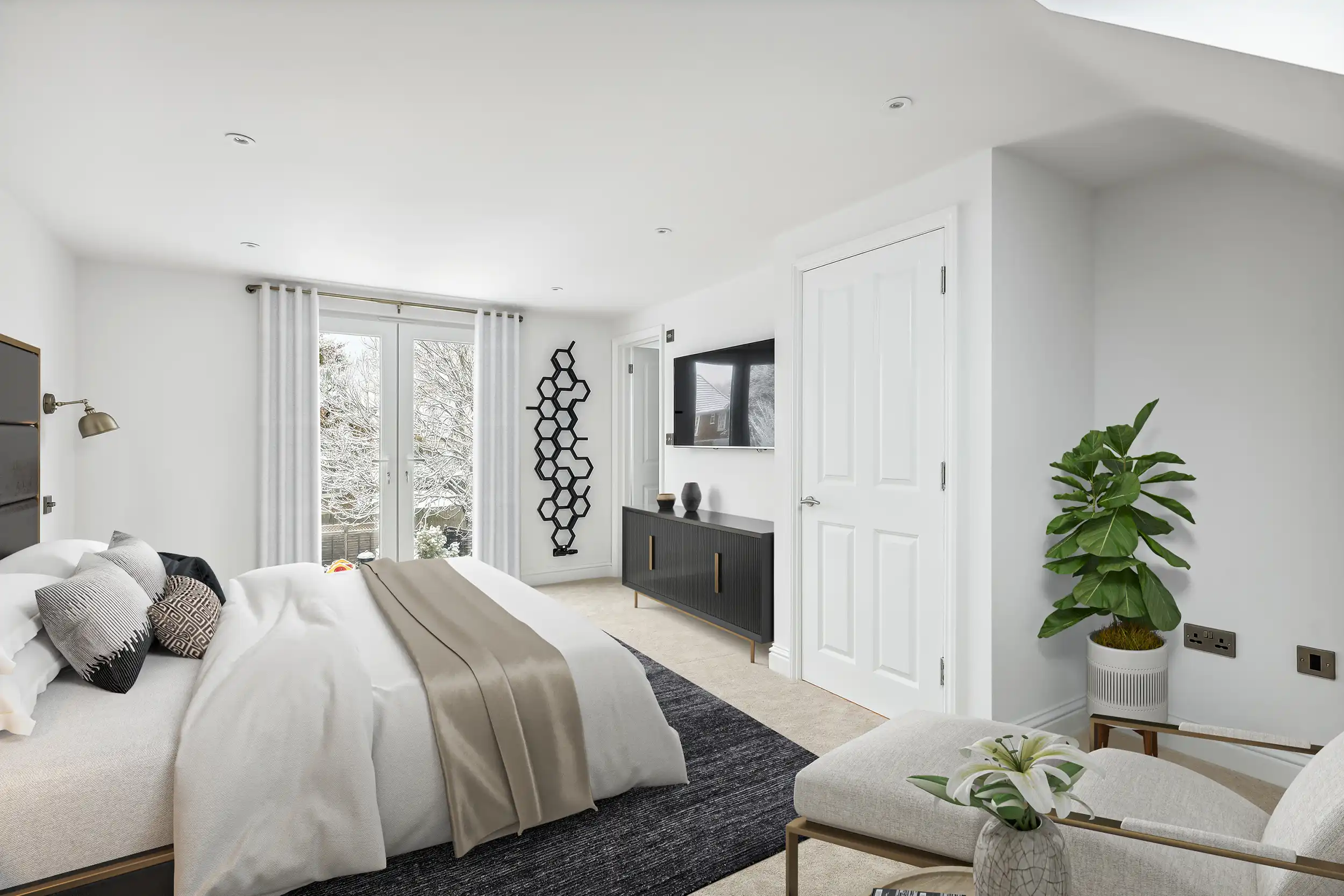 a bedroom with a large bed and white walls