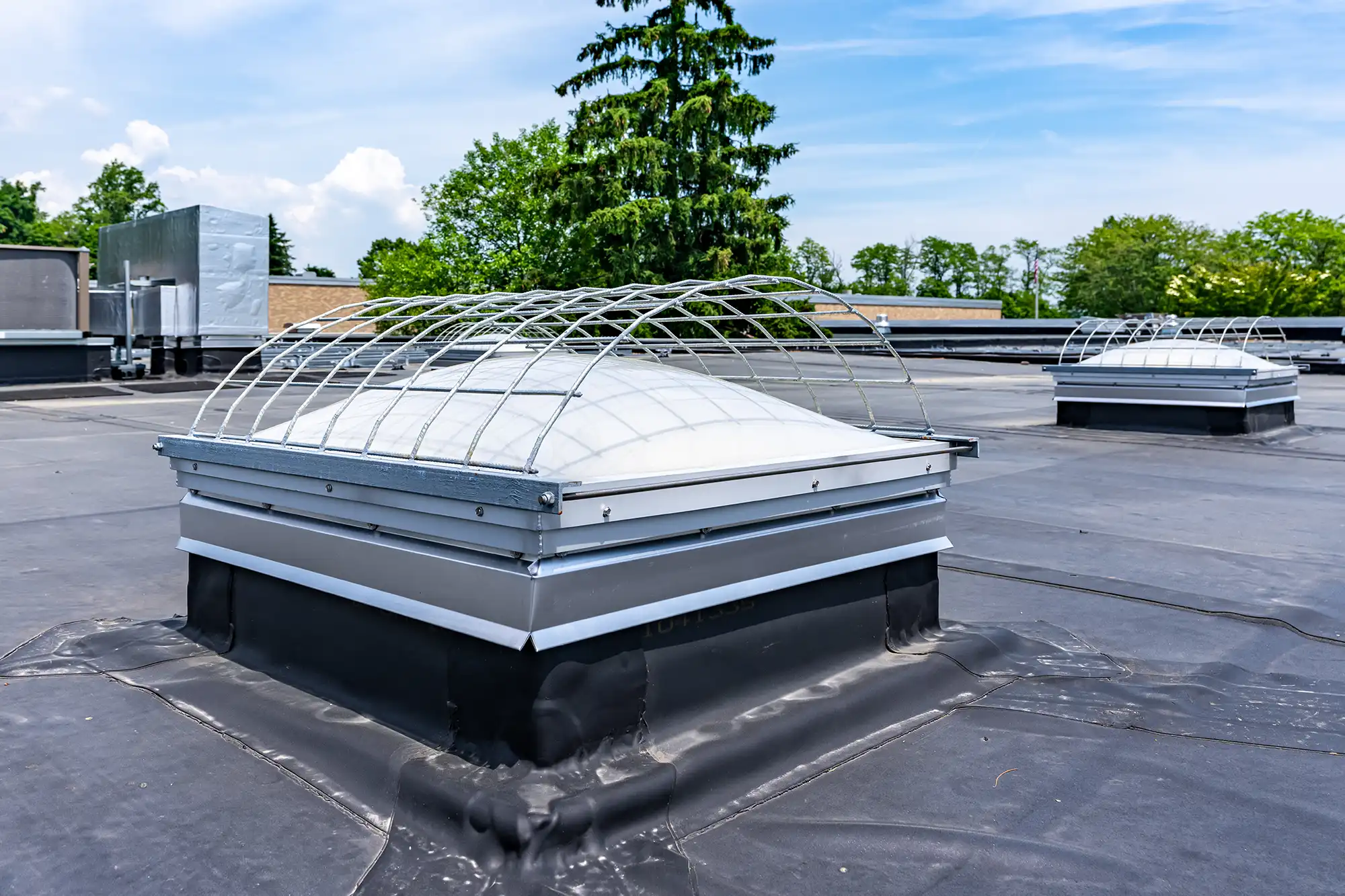 The roof of a commercial building with a flat roof.
